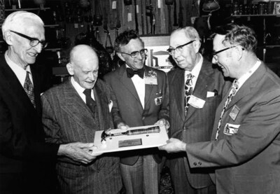 Walter J. Hachborn and Henry Sittler attend a Golden Hammer presentation. (CNW Group/Home Hardware Stores Limited)